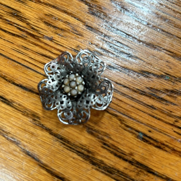 Assorted costume jewelry.  Includes 8 pieces. Seven pins and 1 bracelet. - Picture 4 of 10